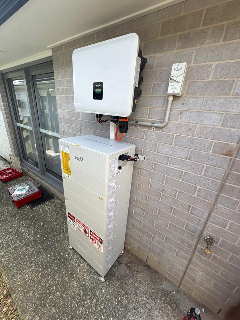 Fox ESS inverter and home battery storage on an interior wall