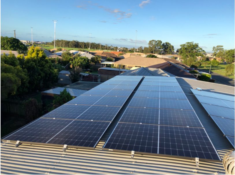 Solar panels installed on an elevated Colorbond roof, showing wide panel array